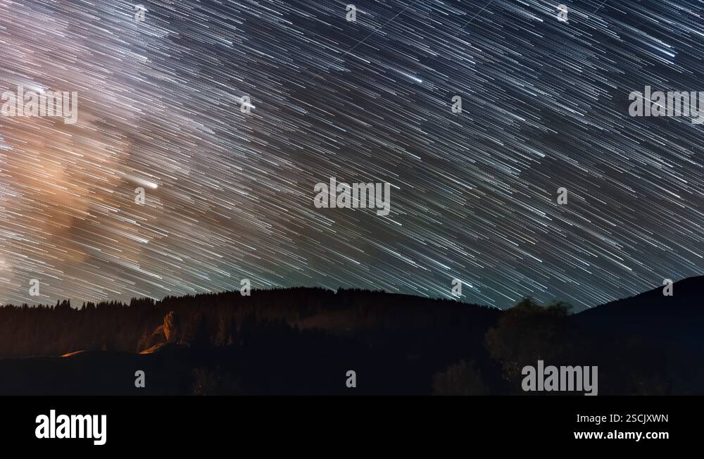 Timelapse of moving star trails in night sky. The Milky Way Galaxy ...