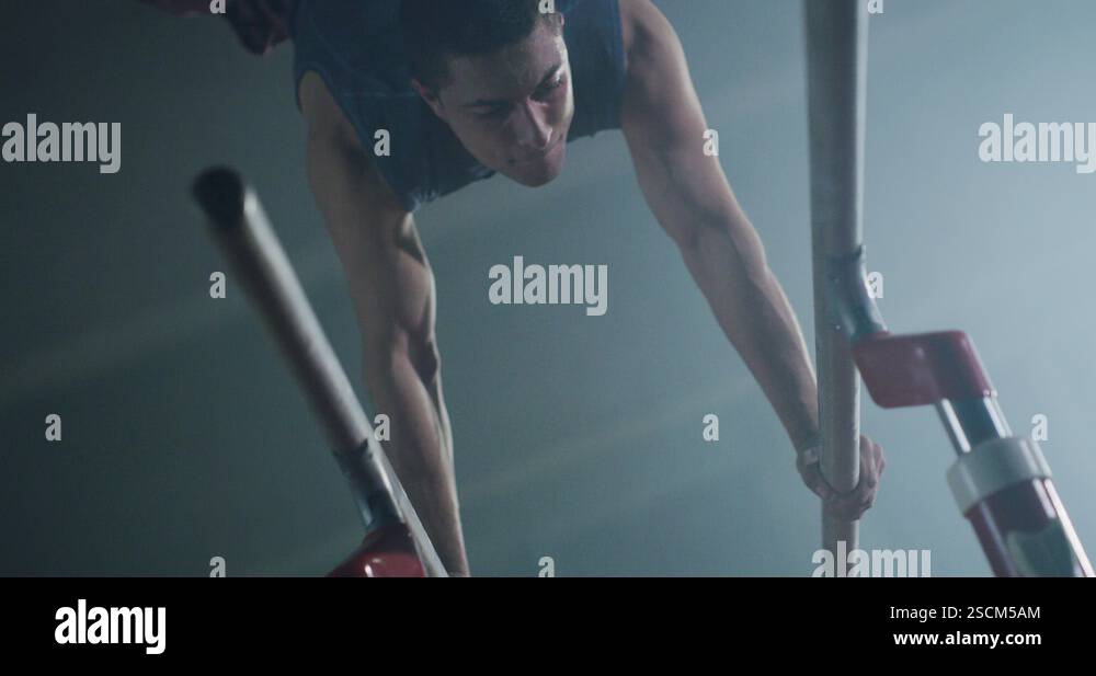 Attractive Muscular Athletic Man In Sportswear Doing Exercise Parallel ...
