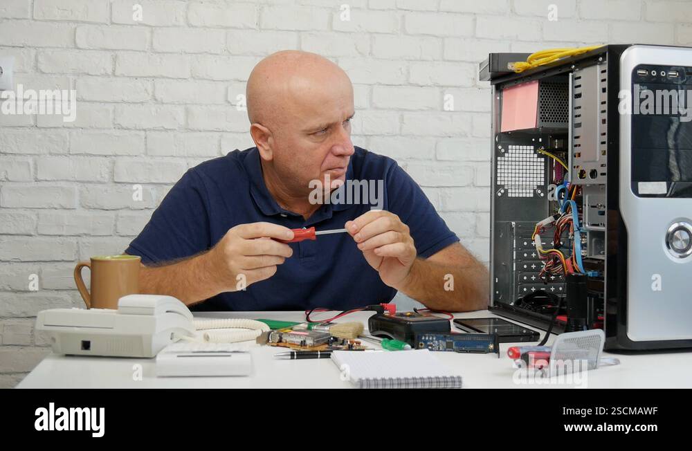 Slow Motion with Busy Engineer Fixing Hardware Problems in a Computer ...
