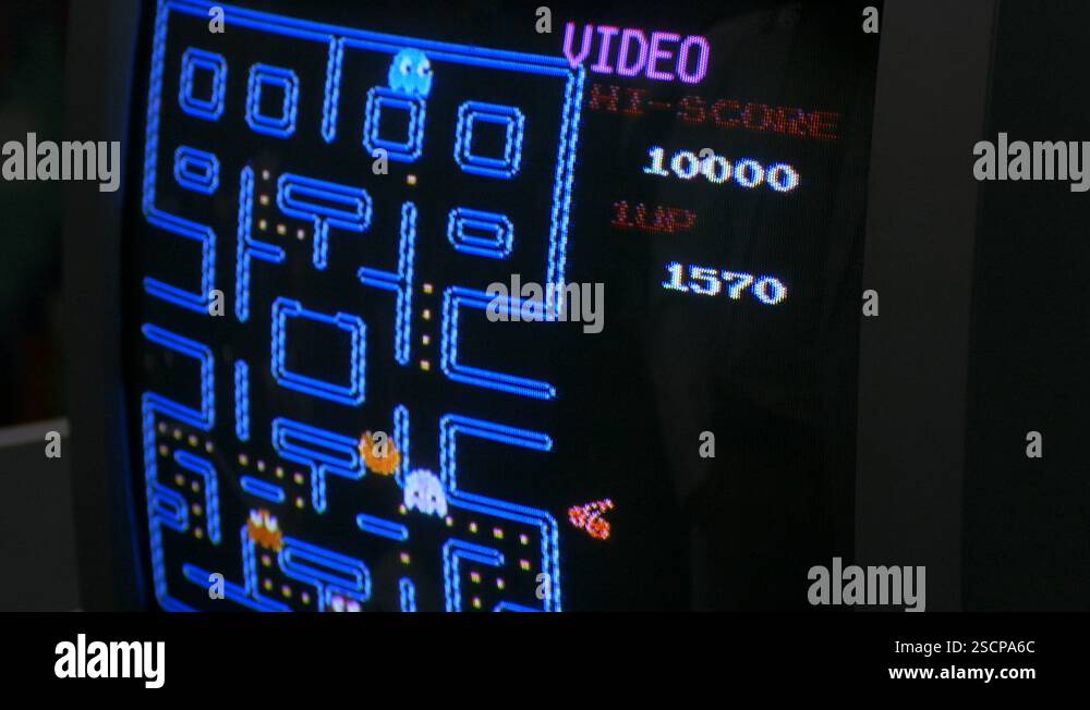 Ungraded: Pac-Man Retro Video Game Running on CRT Screen of Gaming ...