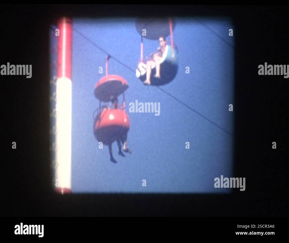 Mother and Son on Chair lift ride at amusement park Stock Video Footage ...