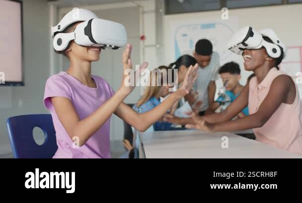 Using VR headsets, students exploring virtual reality in school ...