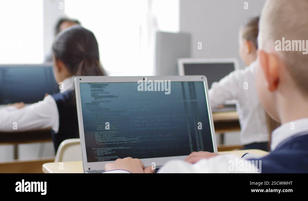 Teenage Pupils Writing Computer Code on Laptops at Lesson Stock Video ...