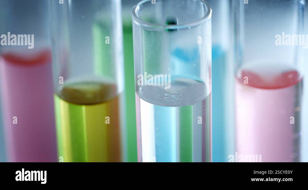 Slow motion macro of micro particles in a liquid are analyzed with ...