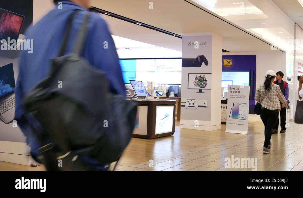 Motion of people browsing at Microsoft store inside Burnaby shopping ...