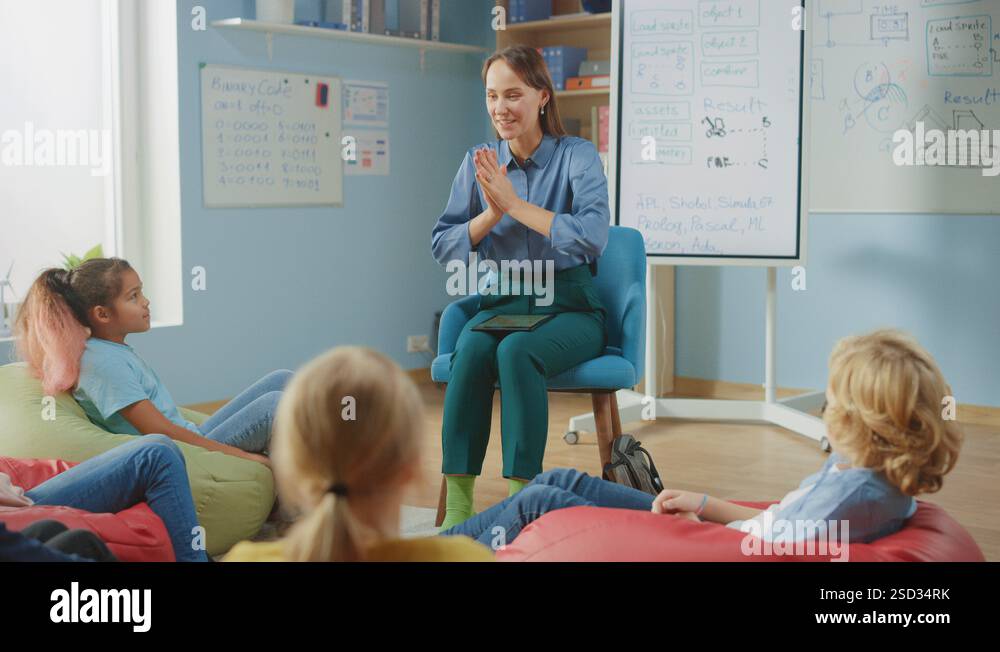School Class: Children Sitting on Bean Bags while Teacher Explains ...