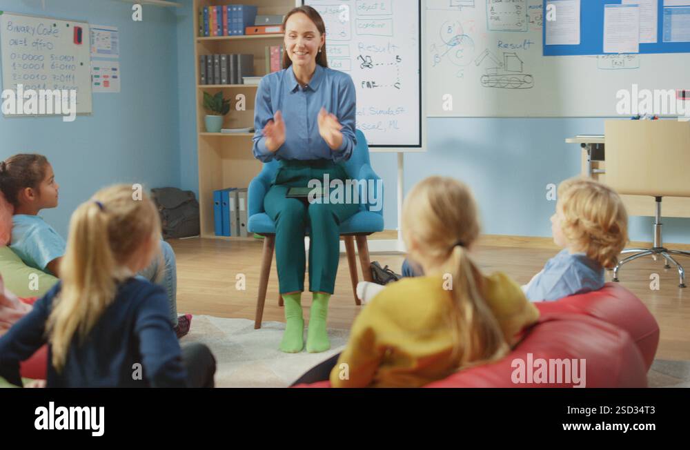 School Class: Children Sitting on Bean Bags while Teacher Explains ...
