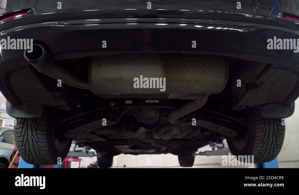 Auto on a Car Lift repairs in a car service garage Stock Video Footage ...