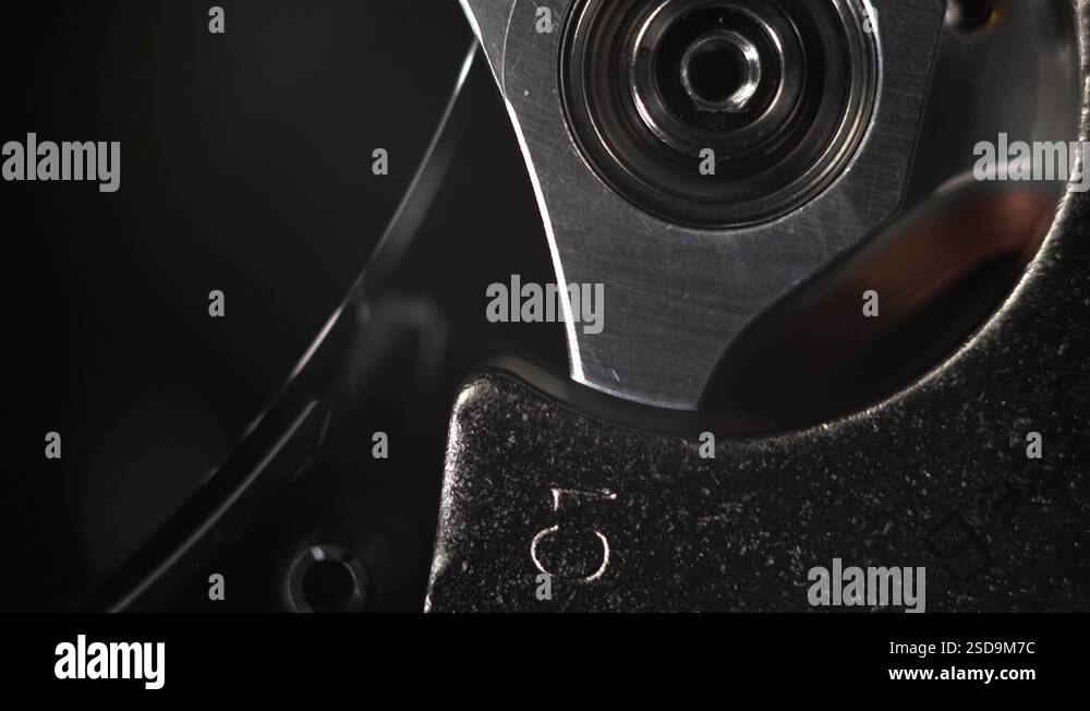 The mechanism of head of hard drive reads information. Macro bearing on ...