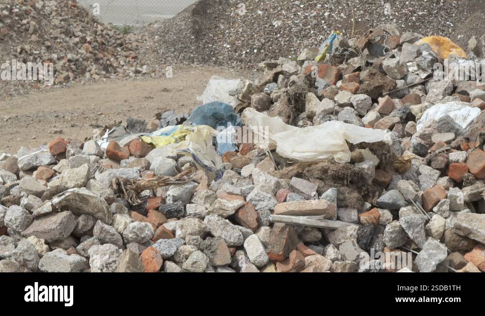 Piles of rubble in an aggregate site with falling rocks Stock Video ...