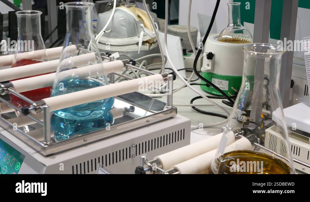 Liquid reagent in glass test tube flasks. Medical pharmaceutical ...