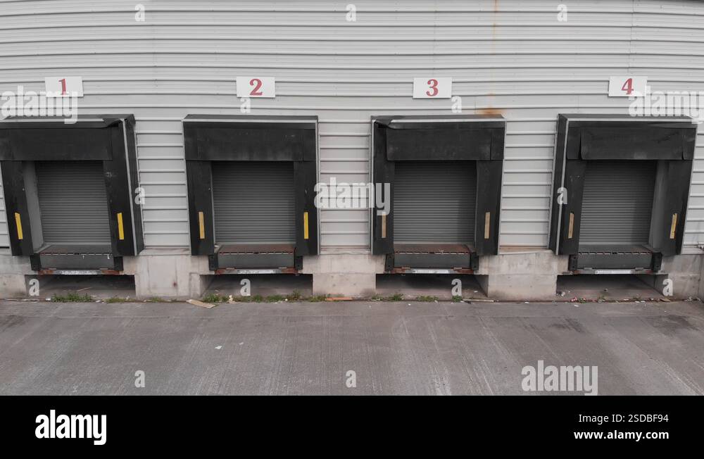 Four Empty Loading Docks At The Loading Bay Of A Warehouse In Dublin ...