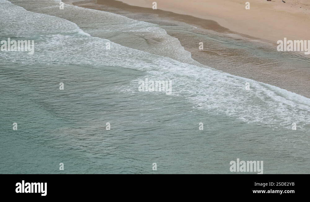 ripple wave hit sand beach background at day time Stock Video Footage ...