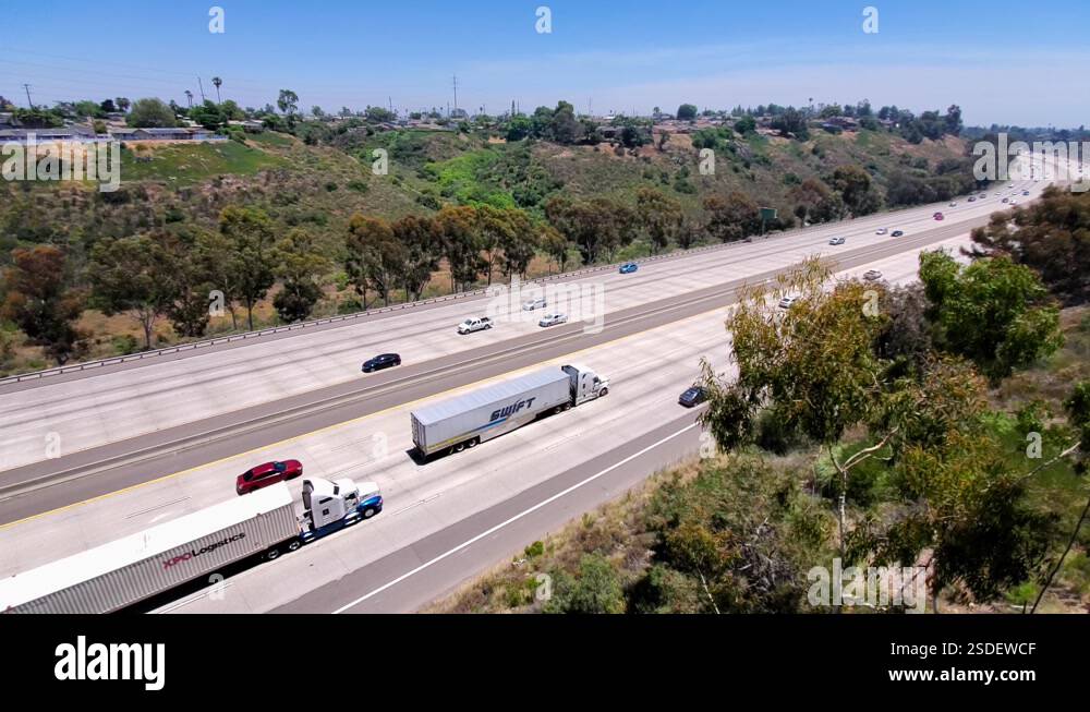 Big rig semi trucks headed southbound on freeway i805 in southern Stock ...