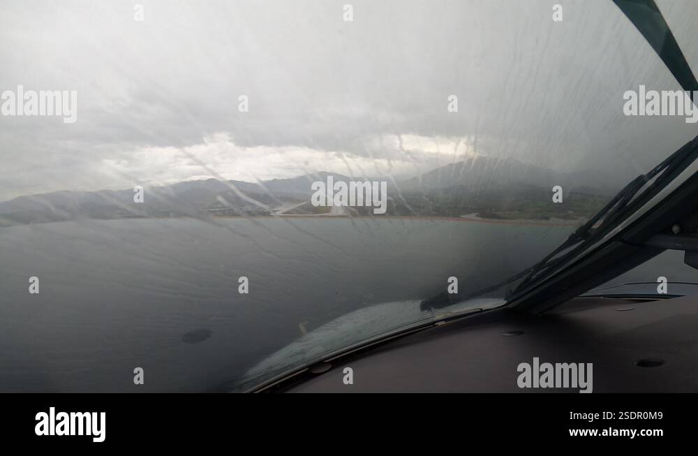 Cockpit Pilot POV footage, Aircraft Landing on Runway in Heavy Rain ...