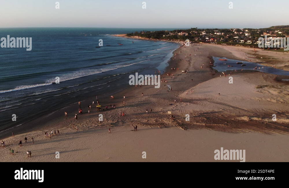 Drone view of people going to see the sunset from the famous dune in ...