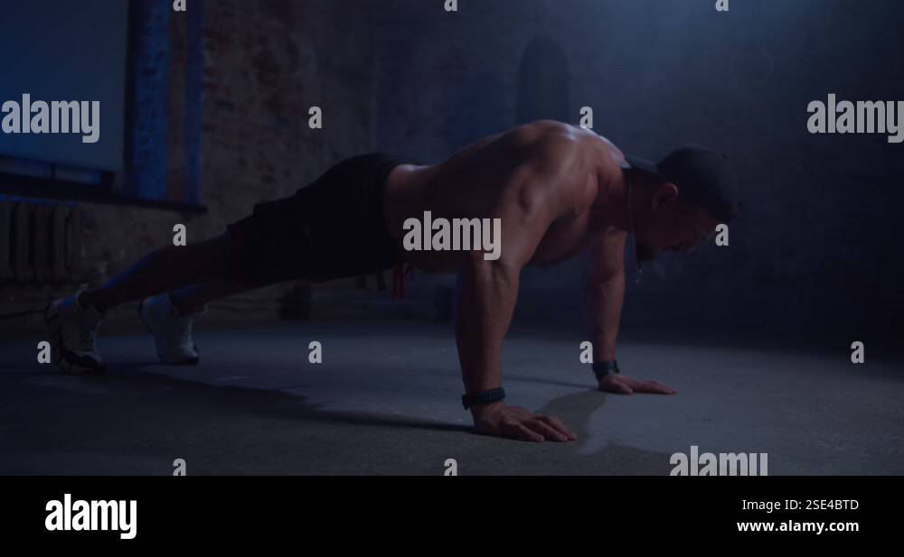 Man athlete doing push ups in a urban gym. Perfect for fitness and ...