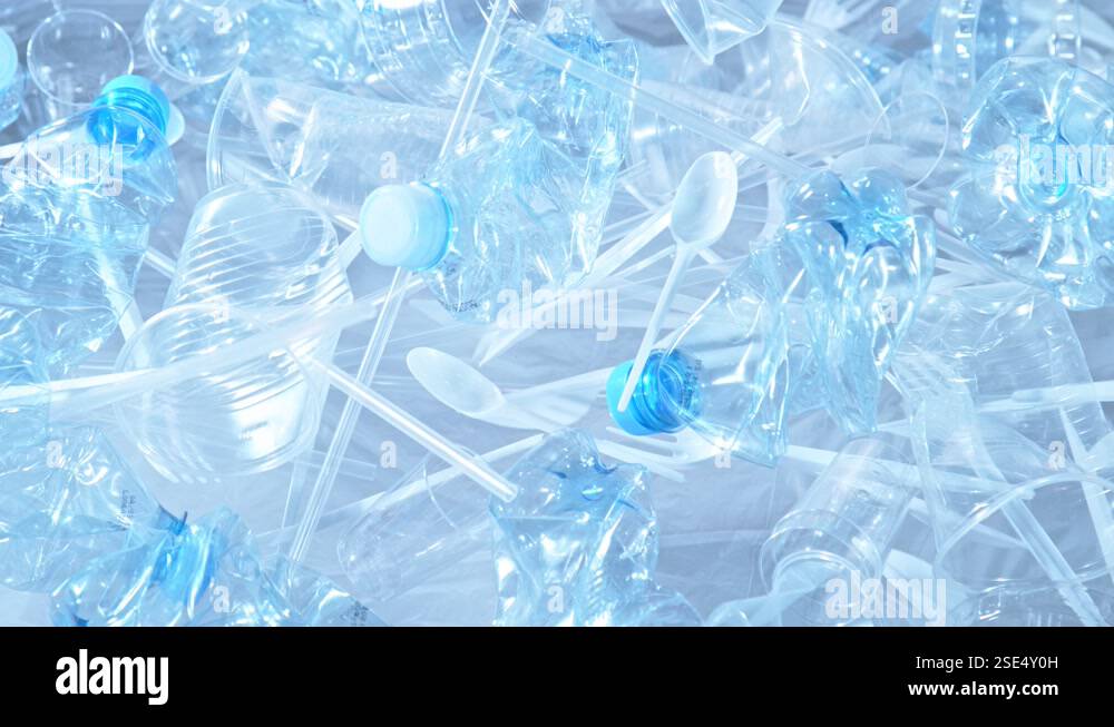 Super Slow Motion Shot of Exploding Plastic Trash on Light Blue ...