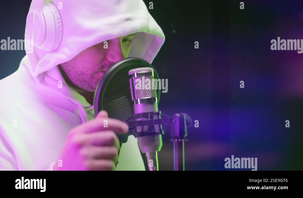 Rapper records his song in studio. Hip-hop music, audio production ...