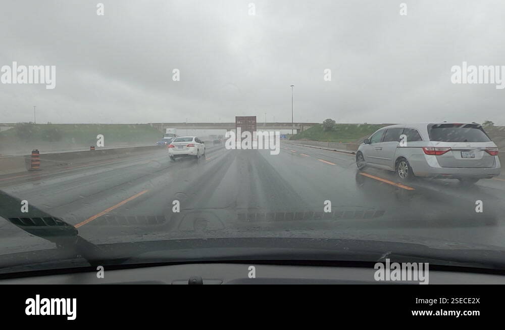 POV driving plate driving in heavy rain poor visibility on highway ...