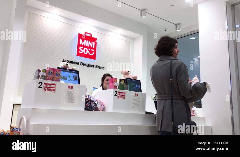 Video Store Customer Line The motion of customer line up for paying goods at Miniso store Stock ...