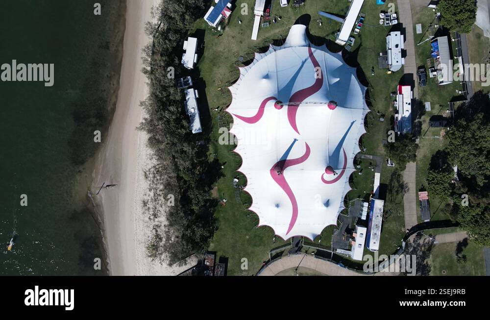 Modern day circus Big top tent structure built next to a coastal ...