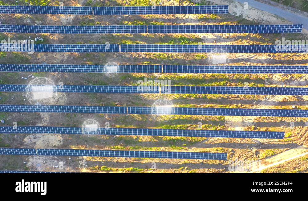 Solar panels with rotating battery icons - top down aerial - 3d render ...