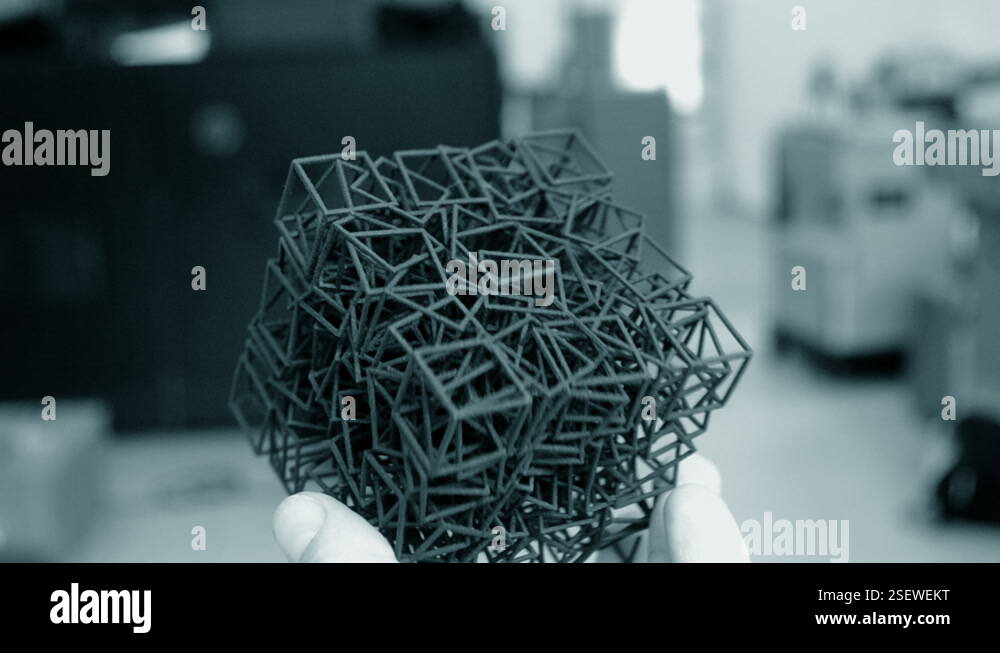 Man holding in his hand model that printed on 3D printer Stock Video ...