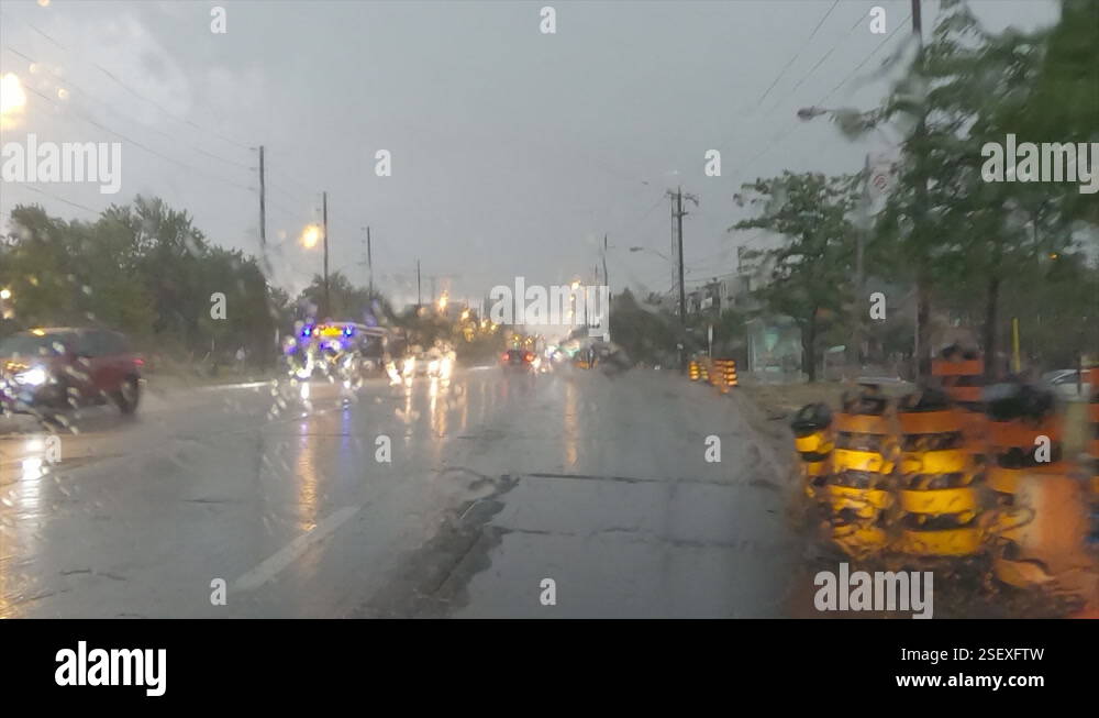POV driving on wet roads and streets in torrential heavy rain Stock ...