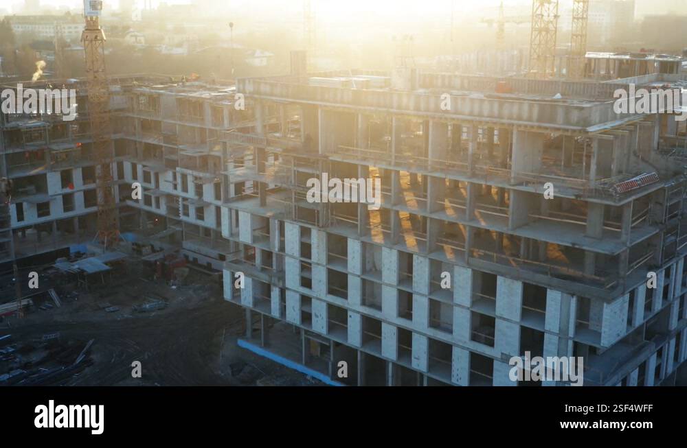 Aerial all-round view of the construction of a multi-storey residential ...