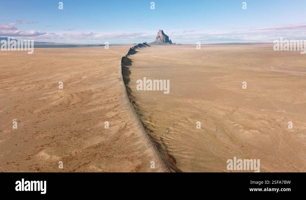 Sharp range of Ship Rock stone formations with blue skyline in the ...