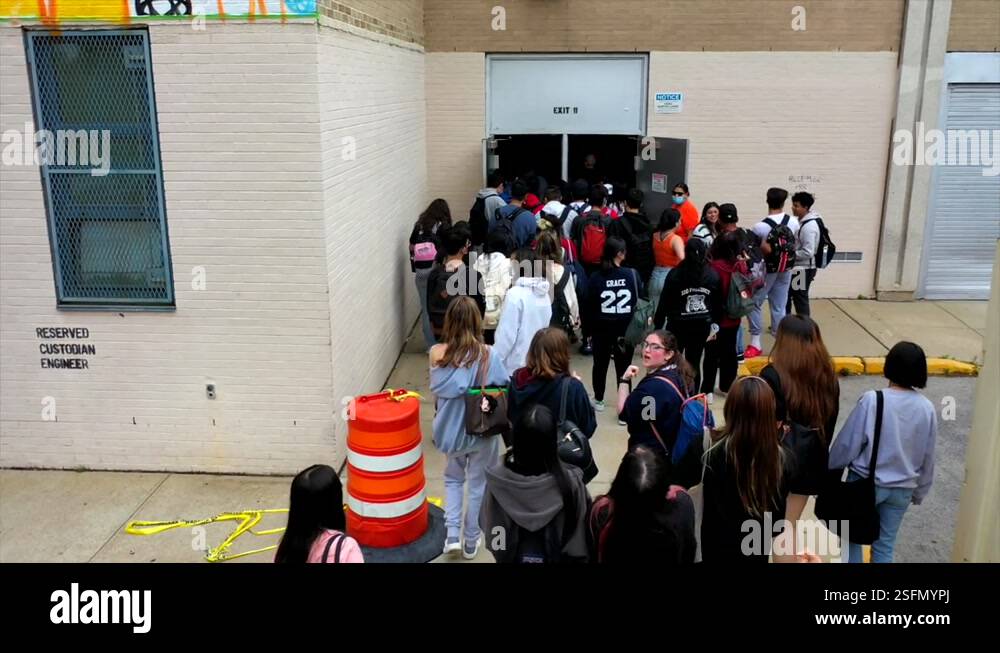 Low Overhead Shot of Teenagers Returning to the School Building - Pt ...