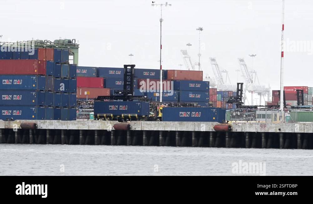 HD video fork lift loading containers on big rig trucks at the Port of ...