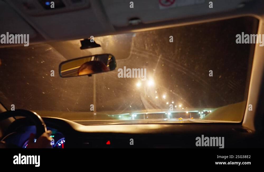 Inside View of the Windshield of a Car that is Driving Along the ...