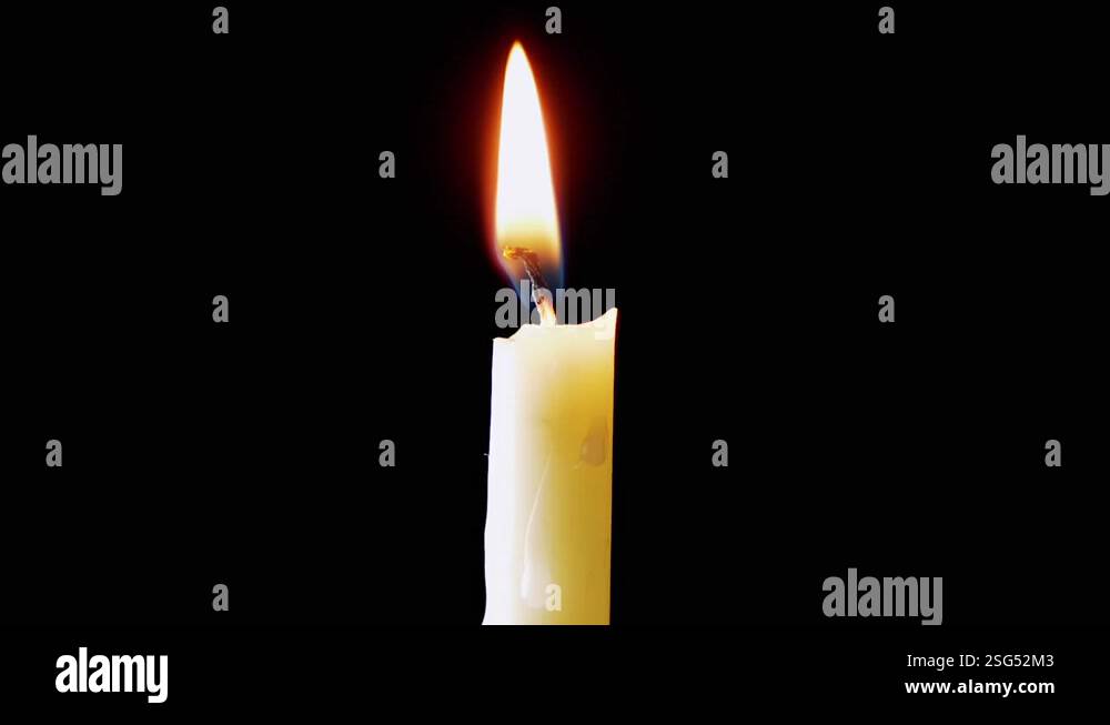 Burning White Candle with a Bright Flame on an Isolated Black ...