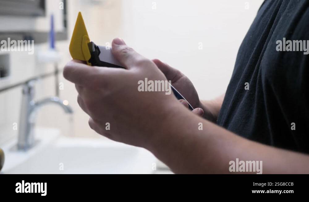 Man puts guard on razor for buzzcut 4K Stock Video Footage - Alamy
