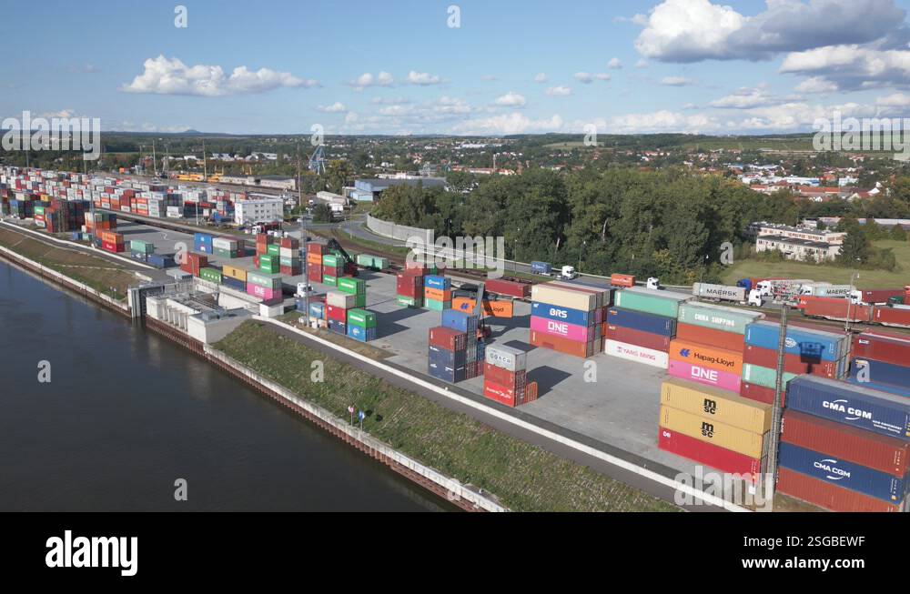 Spreader Takes A Container To Its Destination In The River Port Of 