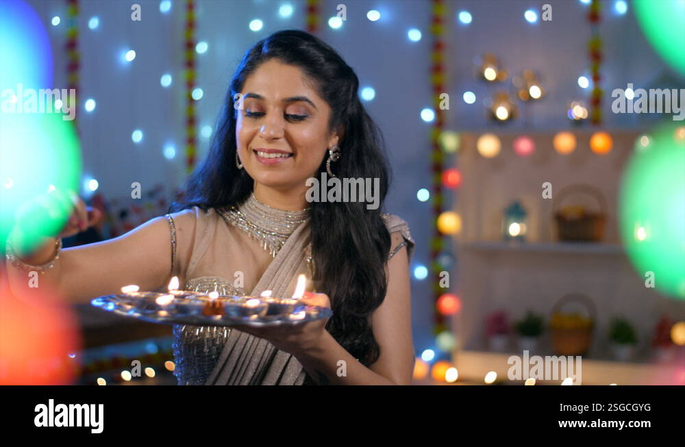 An Indian lady with a Puja Thali on Diwali - Puja rituals, Diwali diyas ...