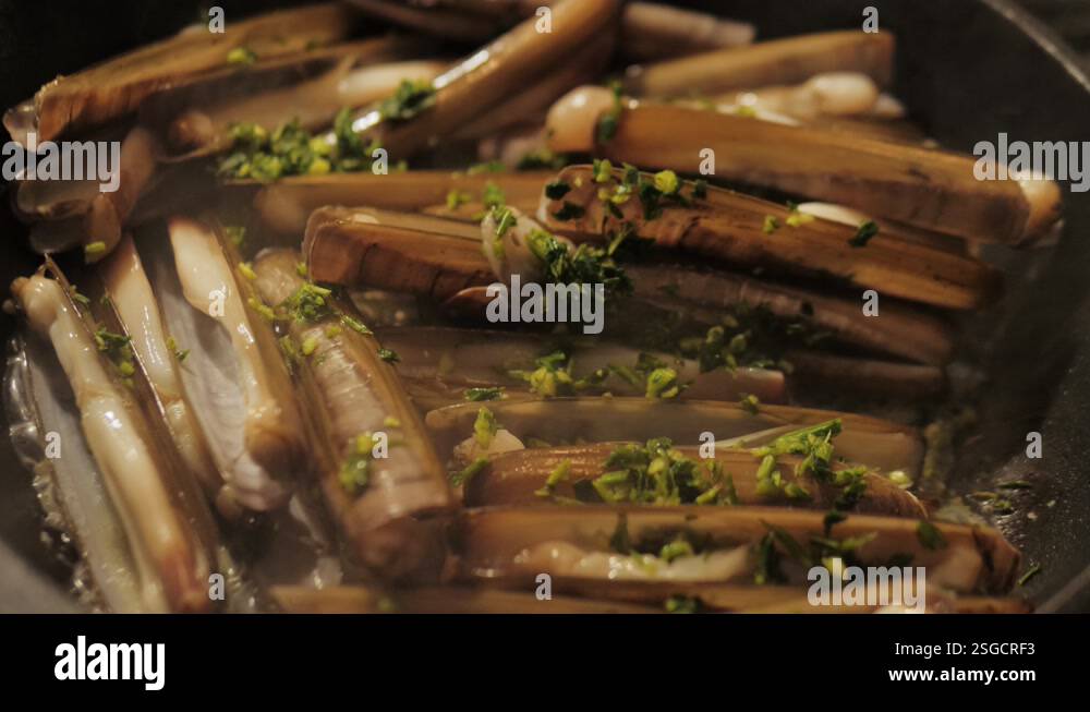 Razor clams seafood grilled on market, grill Spanish Navajas ...