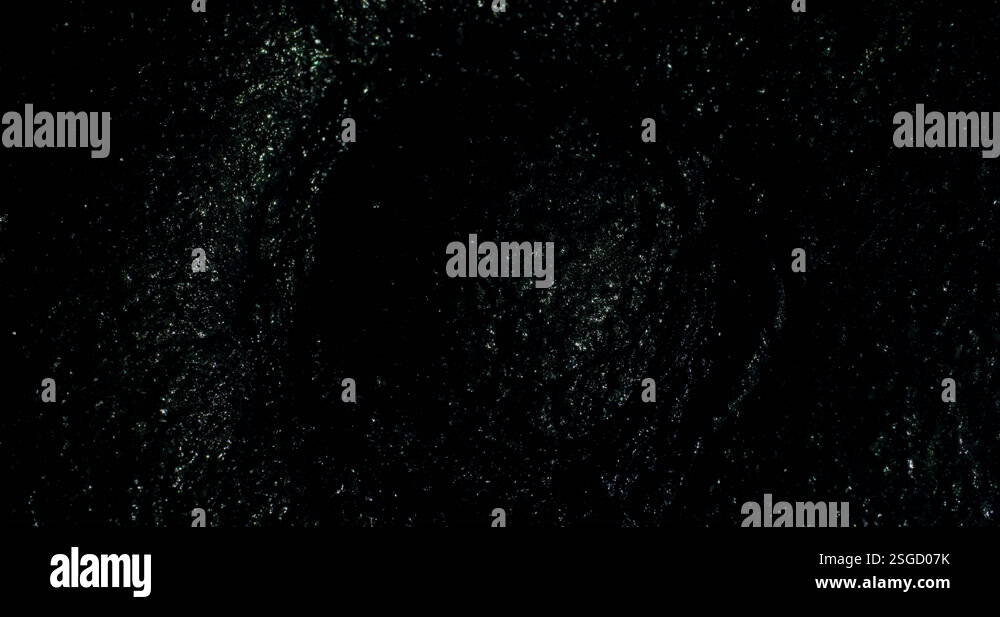 Sparkly slow moving circular shape as it gradually moves both outwards ...