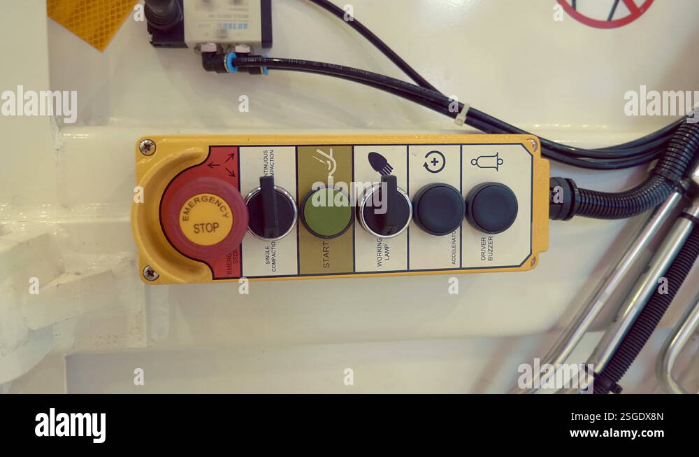 Yellow Control Yellow control panel on board the white truck for the operation of ...