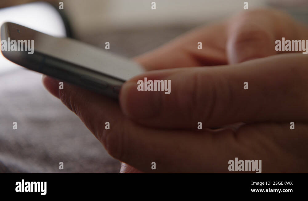 Close up view of female hands using phone. girl's hands swipe across ...