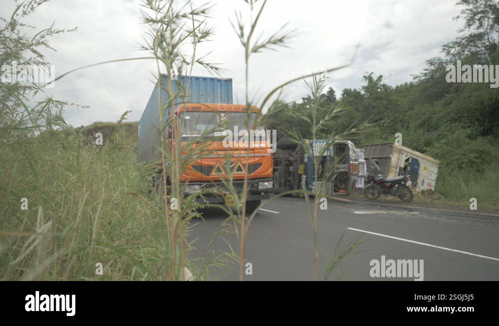 A lorry truck carrying a cold storage container toppled in an accident ...