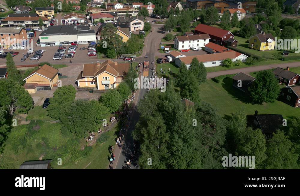 Box car race with spectators watching from each side of the road ...
