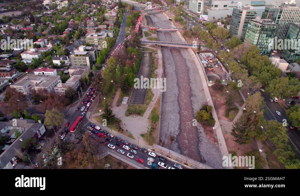 Congested traffic in road and highway intersection in big city. Aerial ...