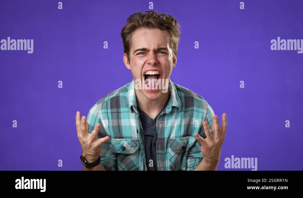 Angry frustrated despair upset with clenched fists portrait of young ...