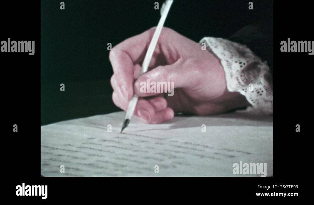 1960s: Portrait of man with pink color. Man uses ink quill pen to write ...
