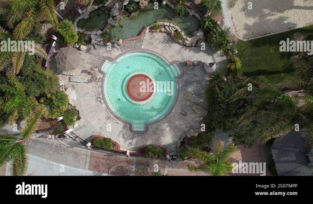 Top Down Aerial View of Circular Hot Springs Pool in Luxury Resort ...