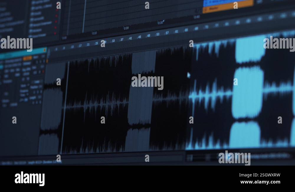 Close up shot of a working on a timeline of a sound programs on a ...