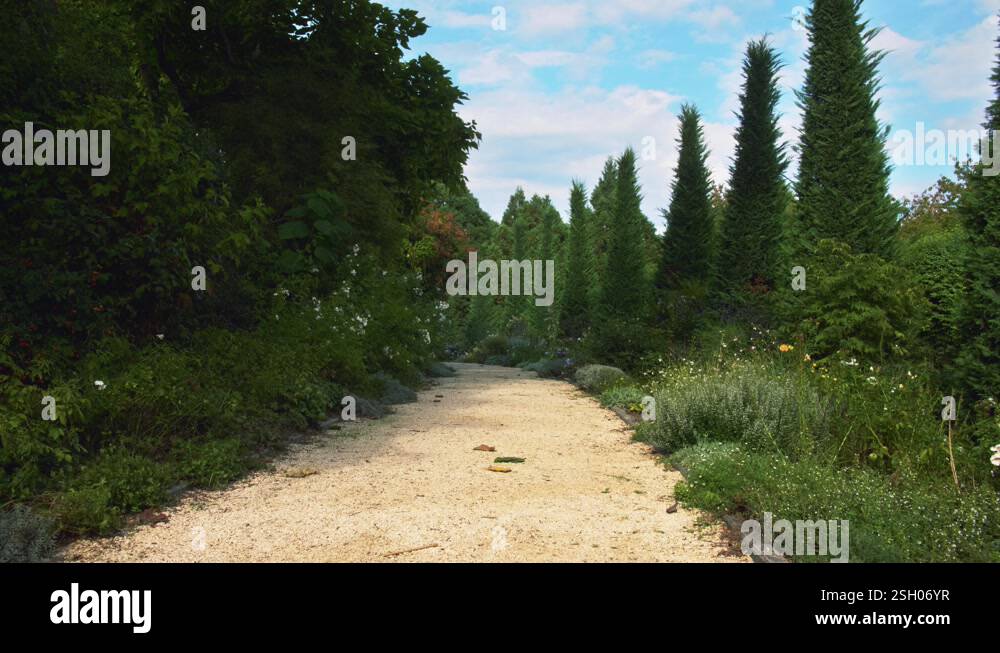 centered orange gravel european pathway turns the curve, left and right ...